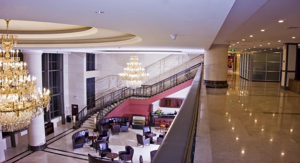 Tang Palace Hotel Akra Dış mekan fotoğraf
