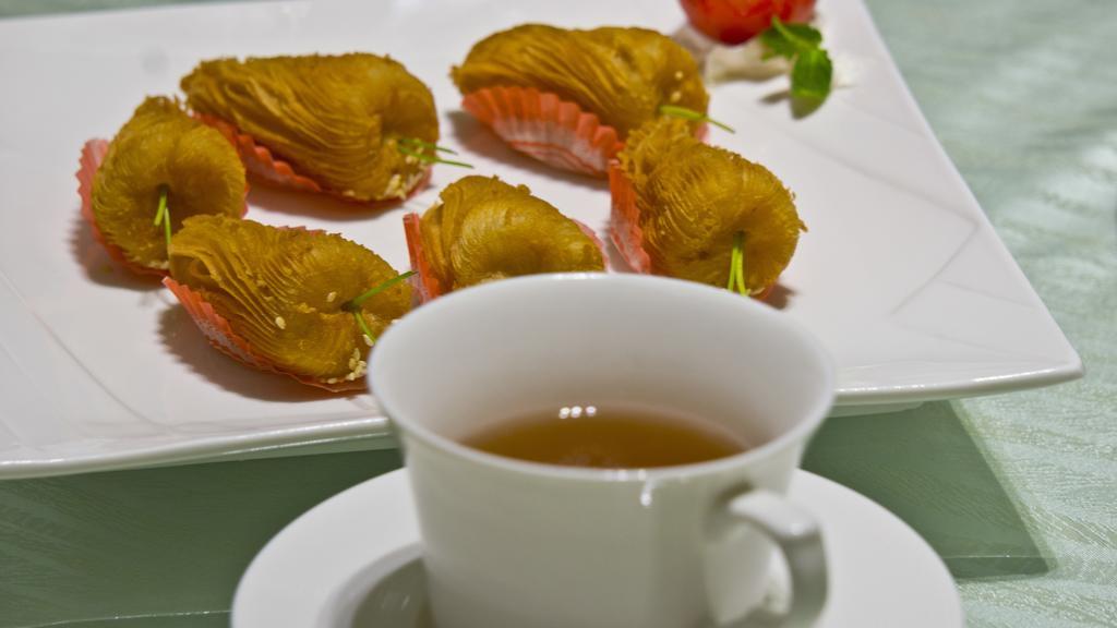 Tang Palace Hotel Akra Dış mekan fotoğraf